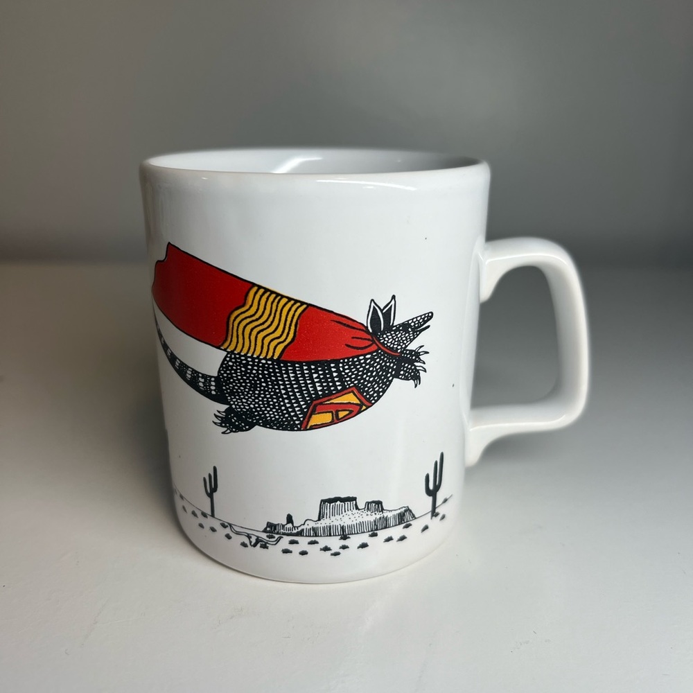 White and Red Ceramic Coffee Mug with Airship Design